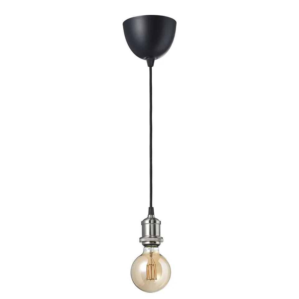 A jallby pendant lamp with a black cord, a chrome connector, and a globe-shaped amber led bulb. Modern and minimalist design.