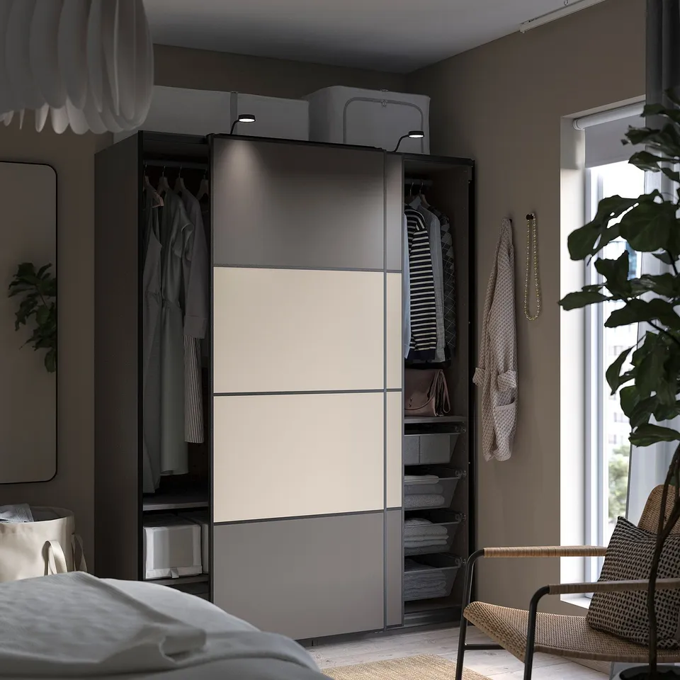 Modern bedroom with open closet, clothes, and hanging chair.
