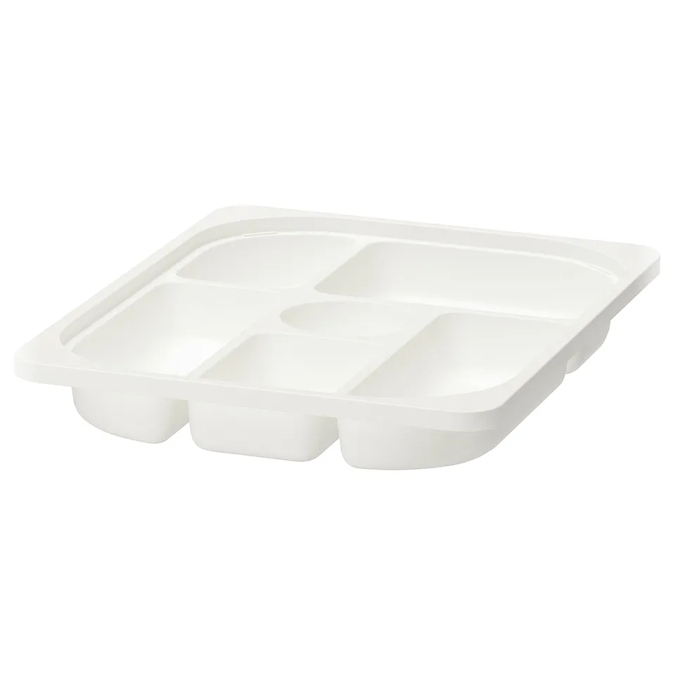White TROFAST storage tray with multiple compartments for organising small items.