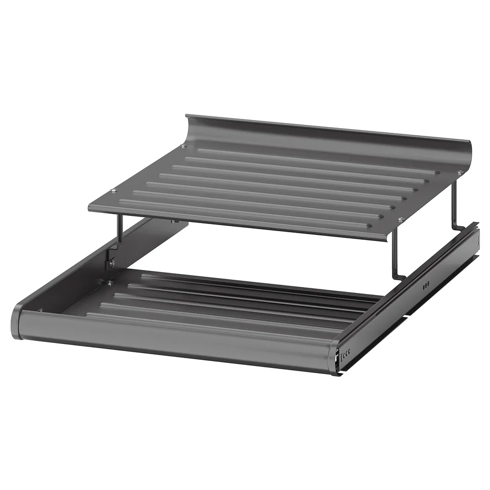 A grey KOMPLEMENT steel shoe rack with two levels for efficient storage and easy access.