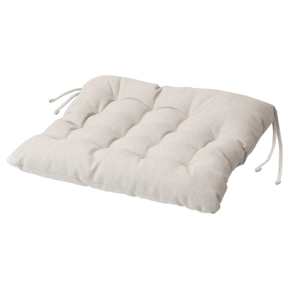 Beige cushioned seat pad with ties, thick and reversible.