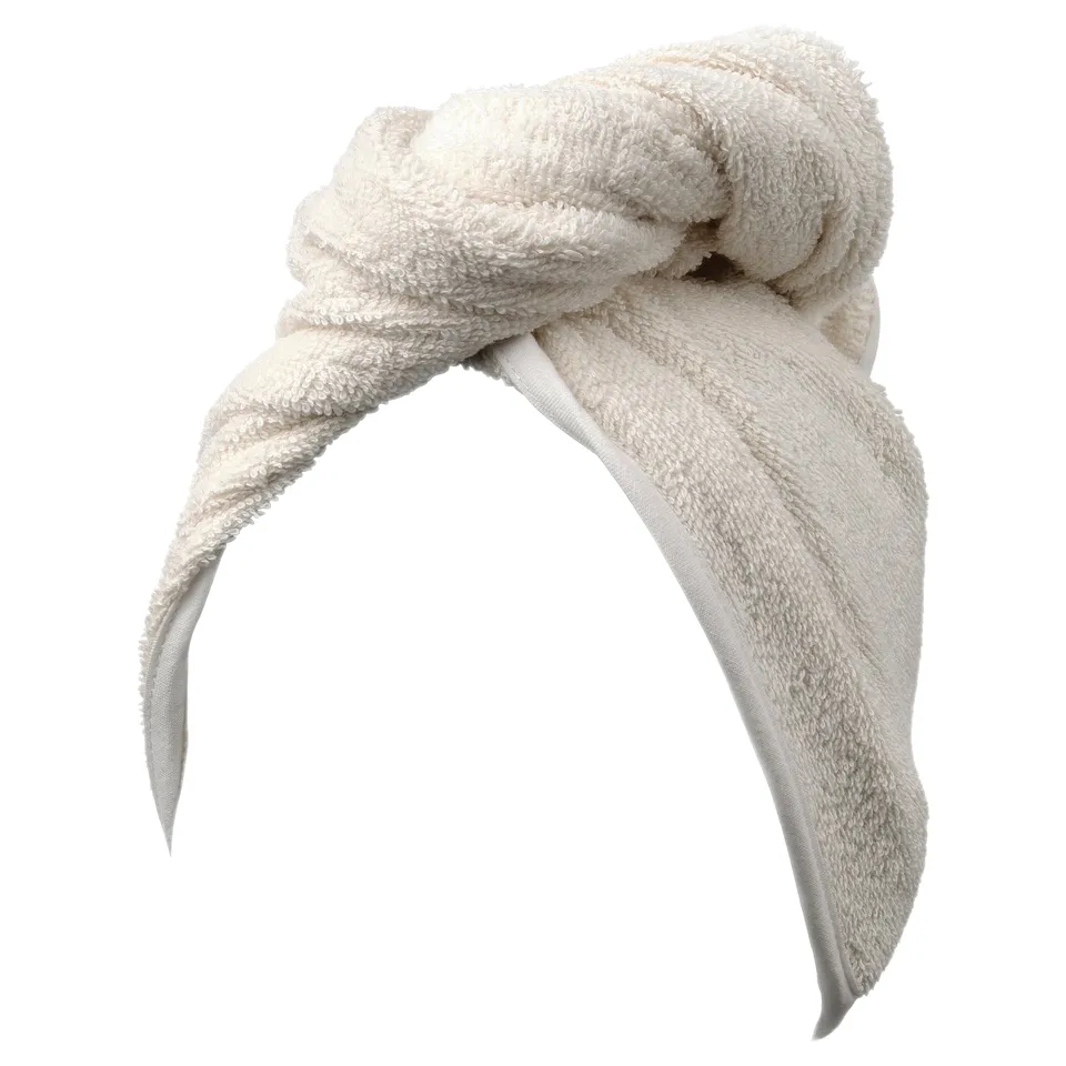 STJÄRNBUSKE hair towel, beige, soft cotton-blend, wide headband with twisted knot design, gentle and absorbent.