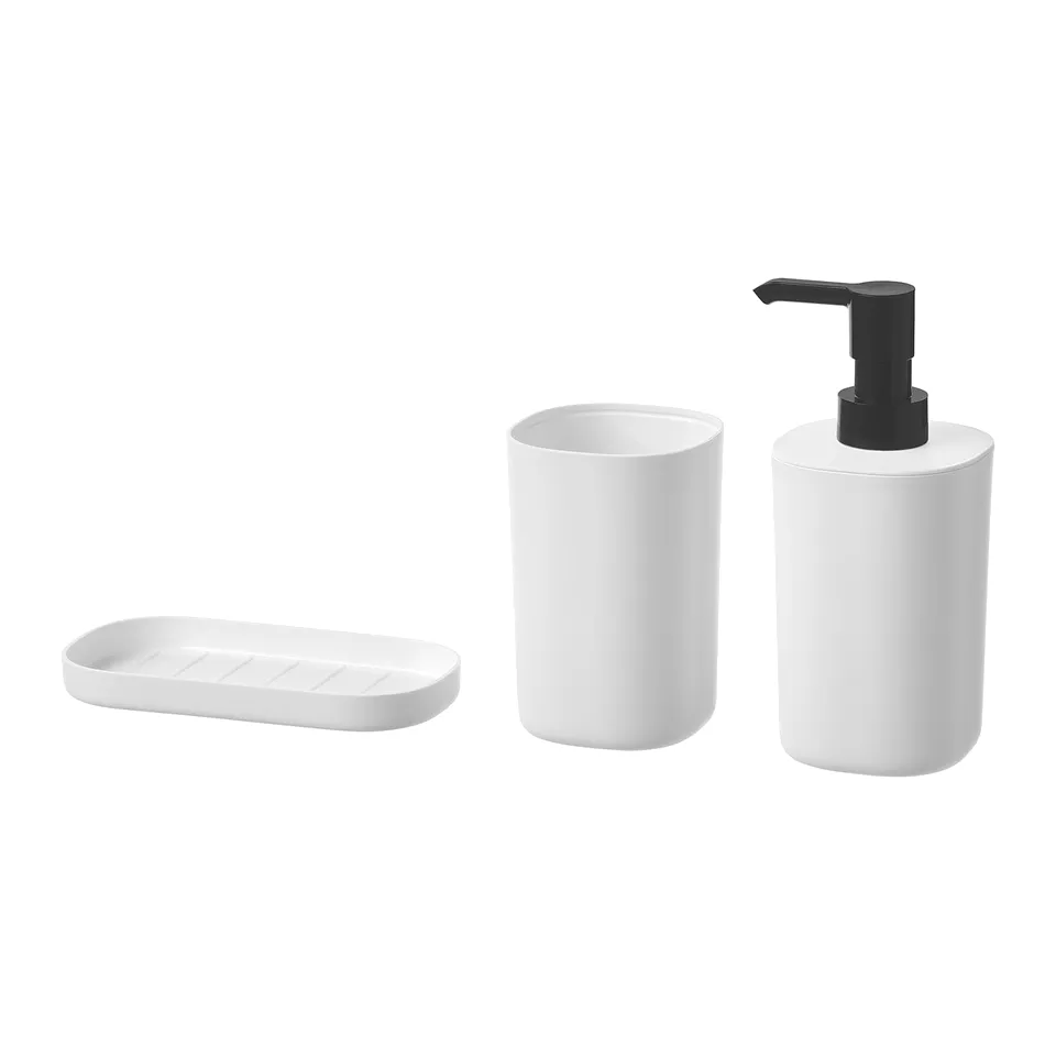 Three-piece white bathroom set including tray, toothbrush holder, and soap dispenser with black pump. Modern minimalist design.