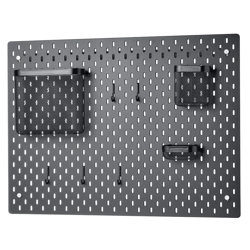 SKÅDIS pegboard, black, rectangular, with mesh pockets and hooks for wall organisation.
