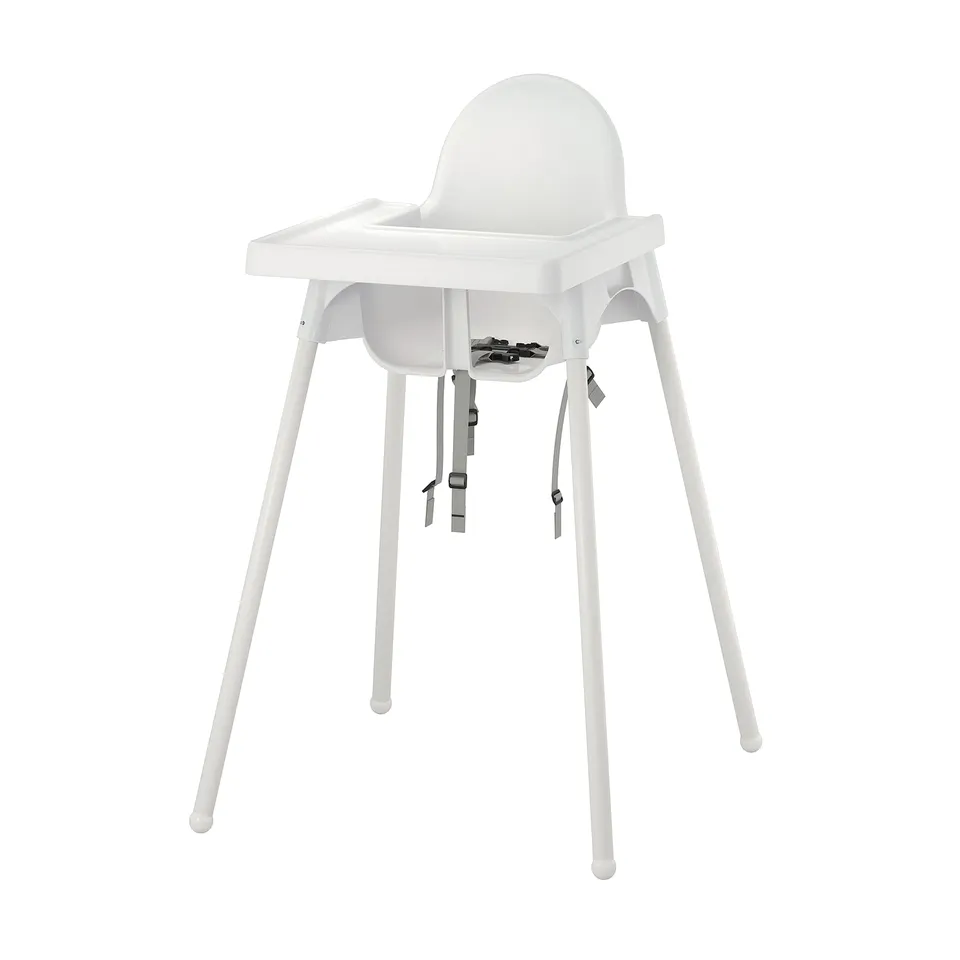 White ANTILOP high chair. Plastic seat, steel legs, simple design.