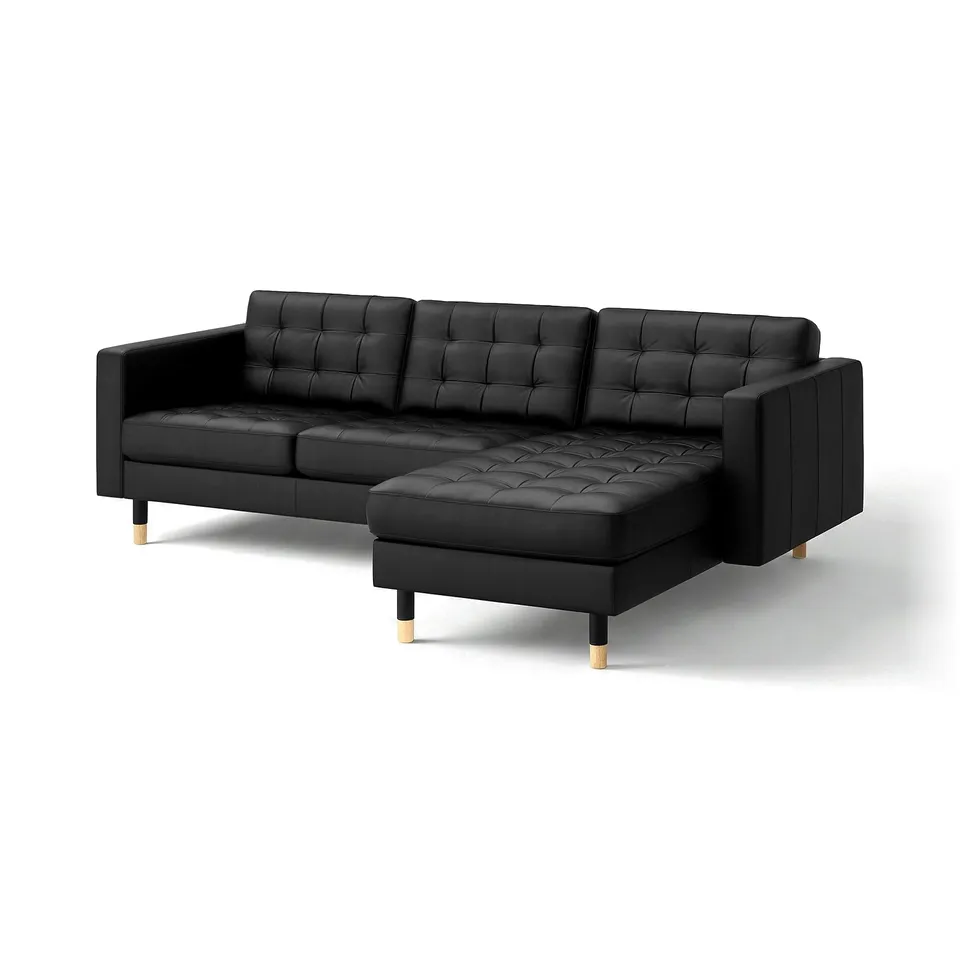 Black leather sectional sofa with tufted cushions and wooden legs. Modern, l-shaped design.
