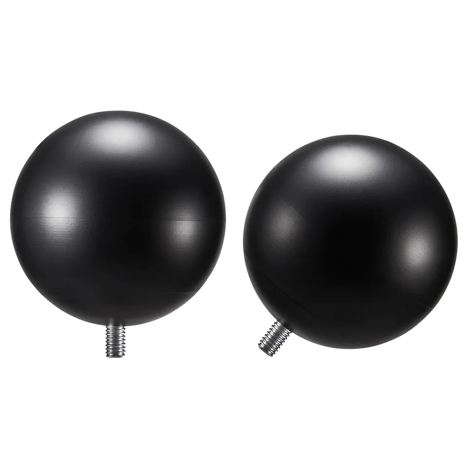 Two black spherical VÄSENTLIG finials with a matte recycled plastic finish and metal screws for mounting.