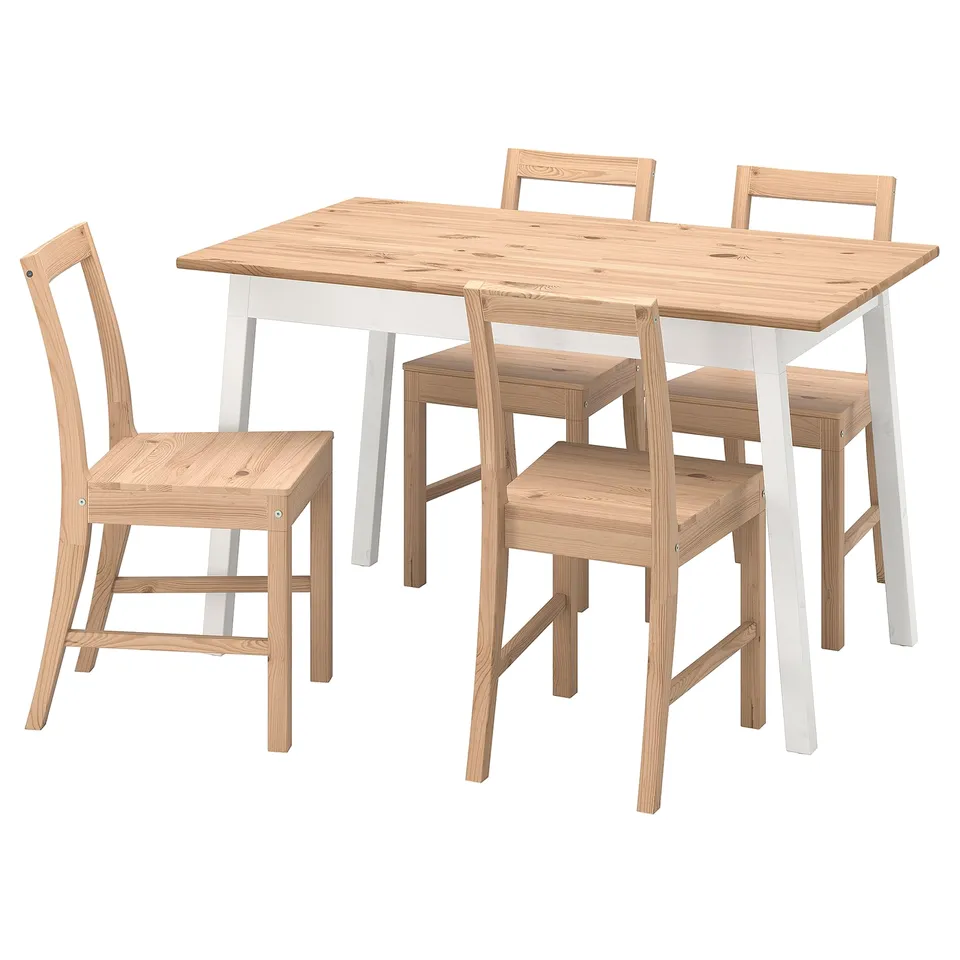 A dinntorp dining set with a light wood finish and white legs. It includes a rectangular table and four matching chairs.