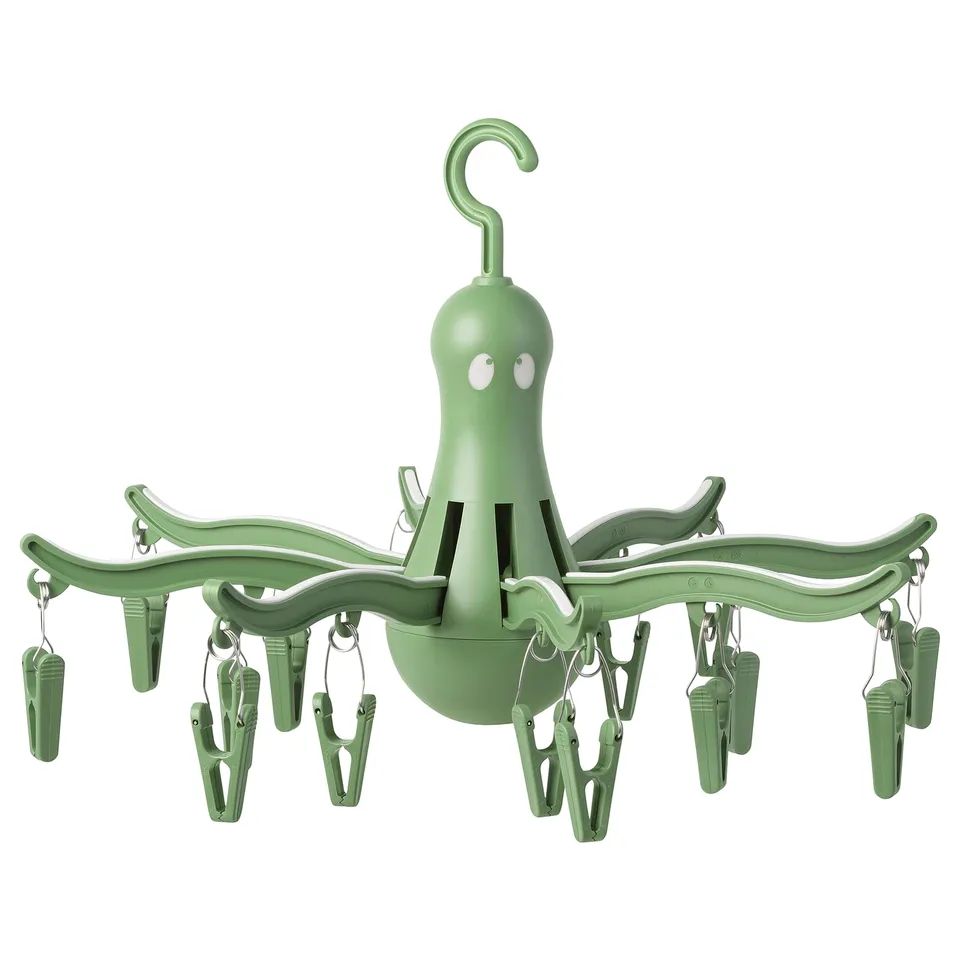 Octopus-shaped green hanger with 16 clothespins for drying socks and small clothes.