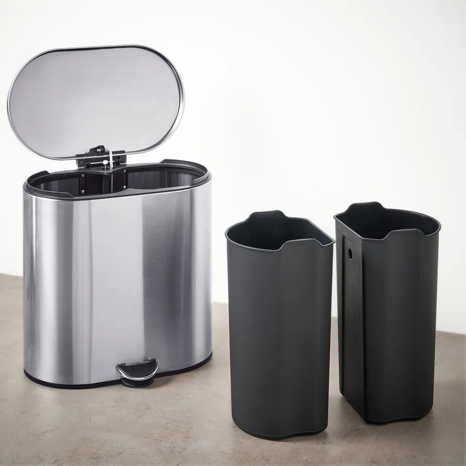 Stainless steel pedal bin with inner bins for sorting waste. Sturdy and stylish with a soft-closing lid. Easy-move design with grip-friendly overhang.