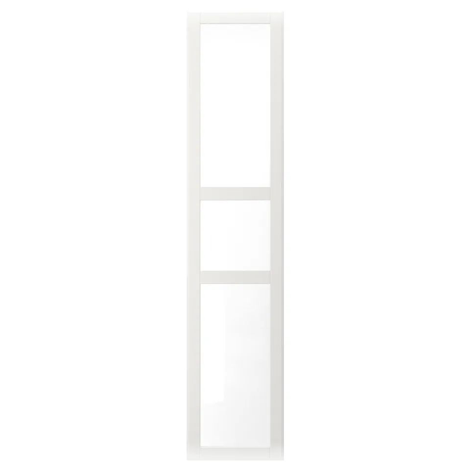 A TYSSEDAL white glass cabinet door with a classic panel design and soft edges.