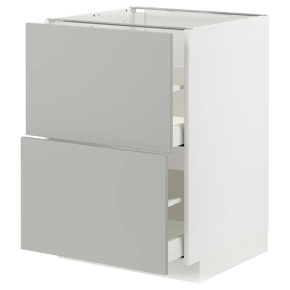 Modern white METOD kitchen cabinet with light grey havstorp drawers, sleek design, steel runners.