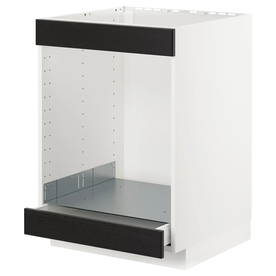 A white METOD kitchen cabinet with black stained drawer fronts, featuring a modern and traditional design.