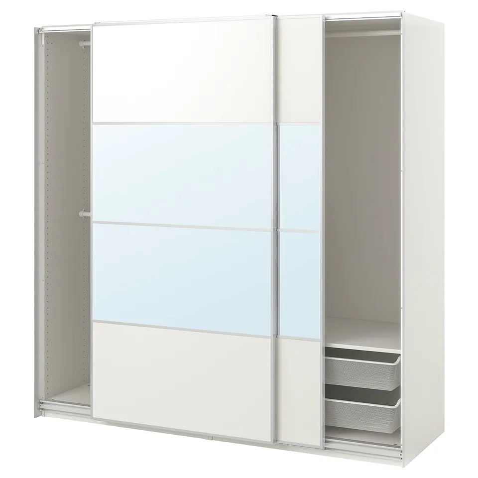 A white PAX wardrobe with mirrored sliding doors and mesh drawers.