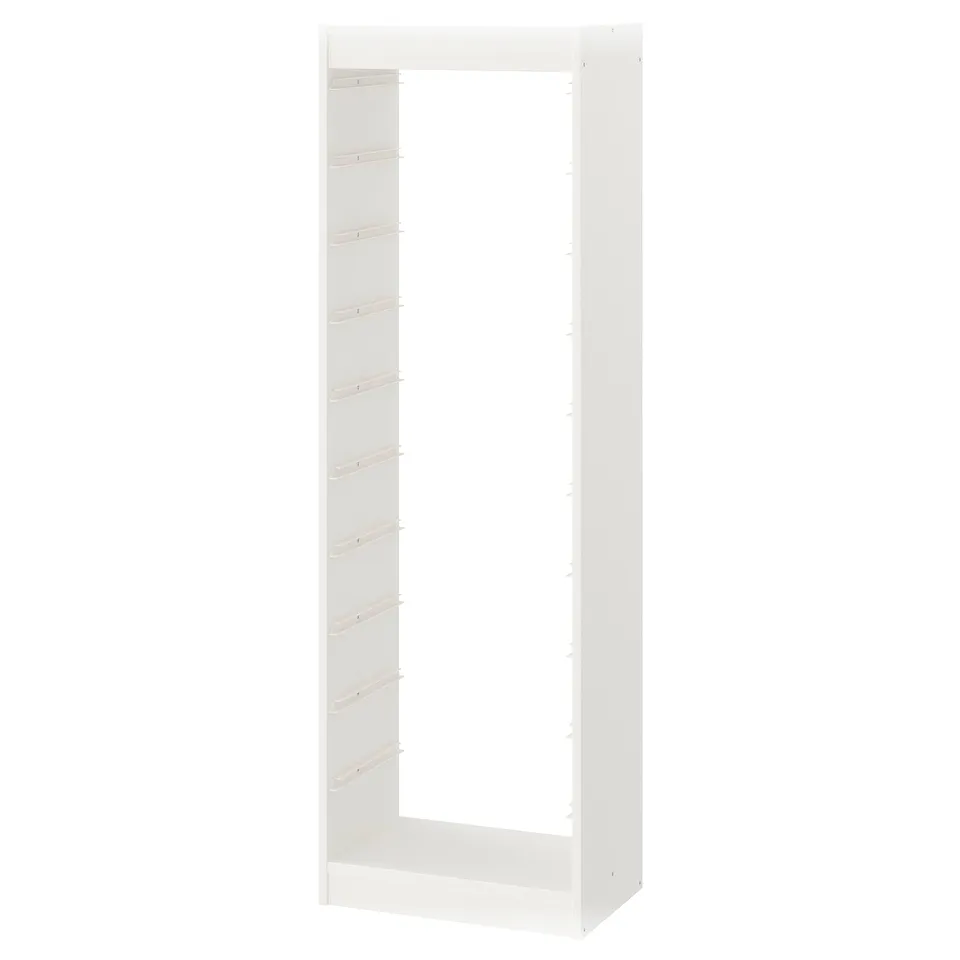 A white TROFAST frame, rectangular, made from particleboard with plastic edging. Its a high unit designed for vertical storage.