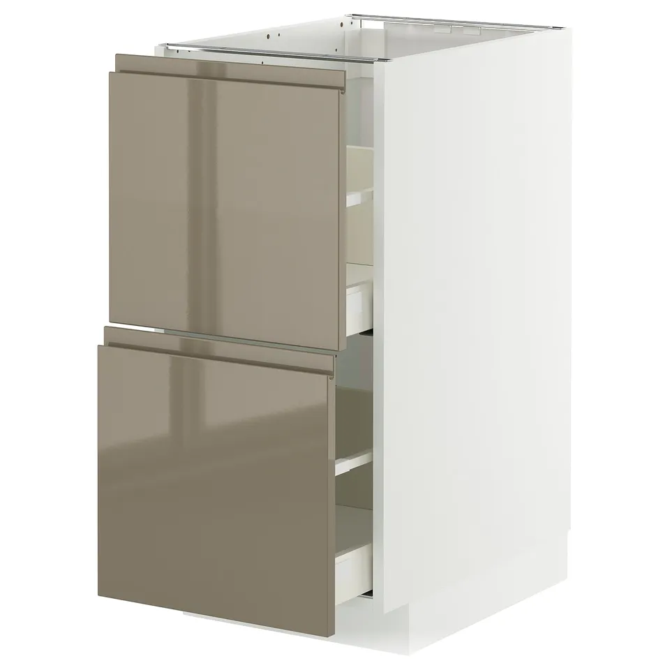 A modern kitchen cabinet from the METOD system with dark grey-brown high gloss fronts and integrated handles.