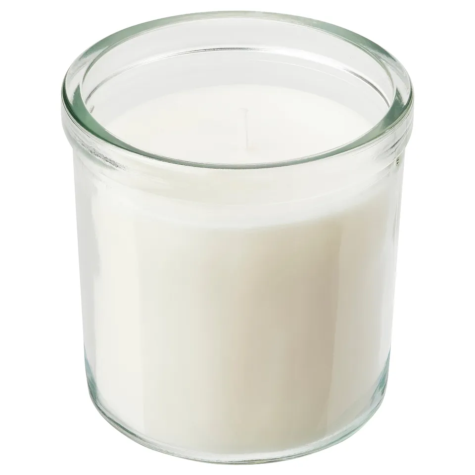 JÄMLIK white scented candle in glass holder.