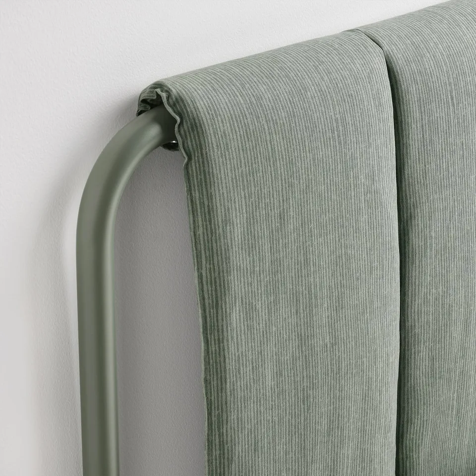 Modern bed frame with sleek lines and upholstered headboard. Grey-green striped fabric and metal accents. Quality design with clean details.
