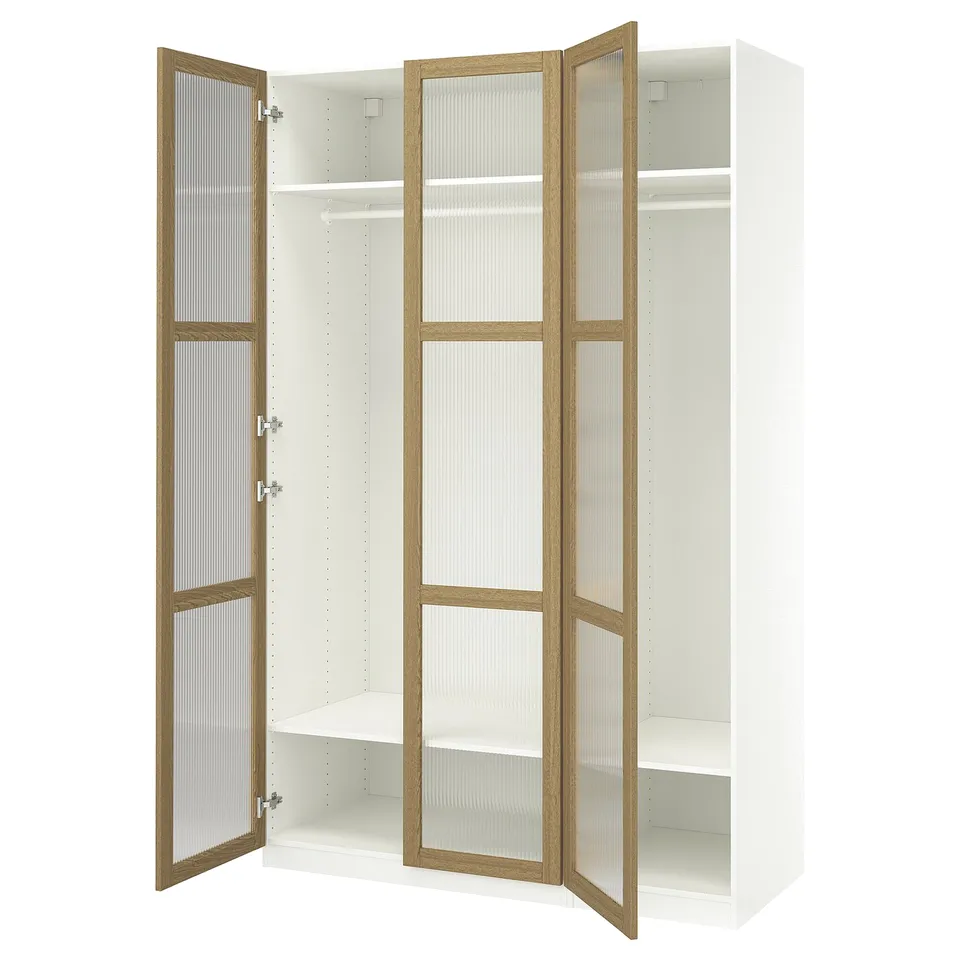 This image a white PAX wardrobe with light brown textured glass doors and silver hinges. It has multiple shelves and a hanging rod inside.