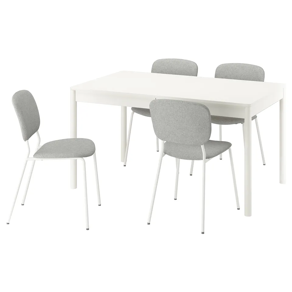 Extendable table and four upholstered chairs, modern design.