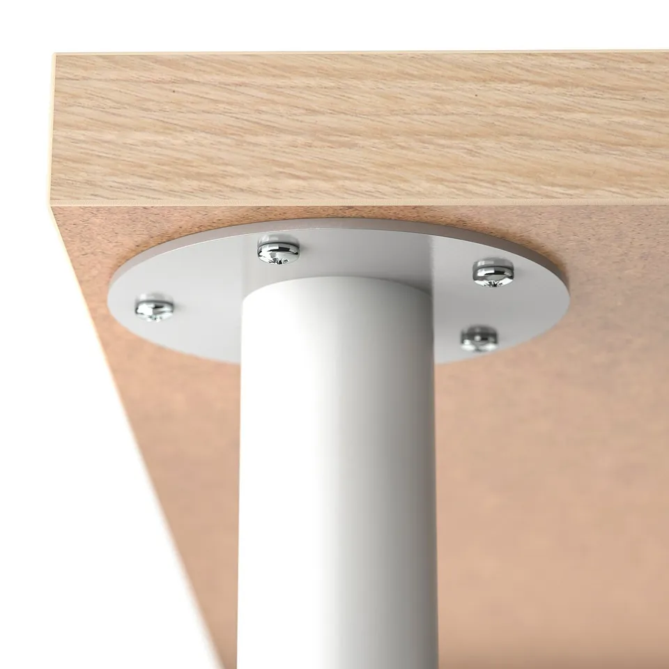 Wooden table leg attached securely with metal screws to underside of table top.