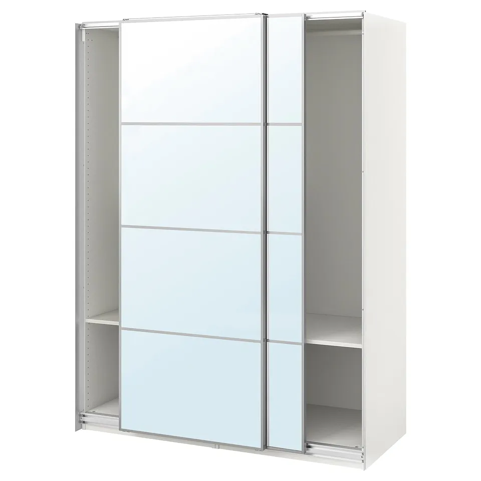A white ikea PAX wardrobe with sliding glass doors. It has an open design for easy access.