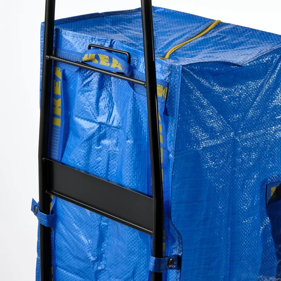 Blue plastic storage bag secured on metal trolley, ready for transport. Durable, practical design.