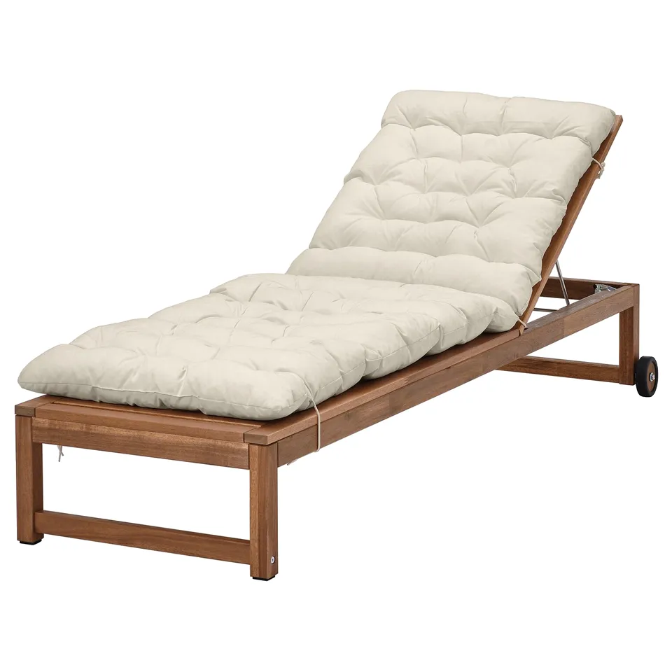Relax on this NÄMMARÖ beige outdoor sun lounger with acacia wood, luxurious padded cushion for comfort.