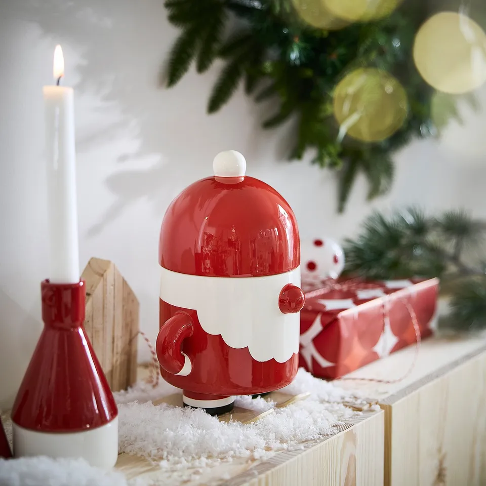 Holiday-themed VINTERFINT red & white candle holder. Small, fits well among christmas ornaments. Made of earthenware, ideal for tealights.