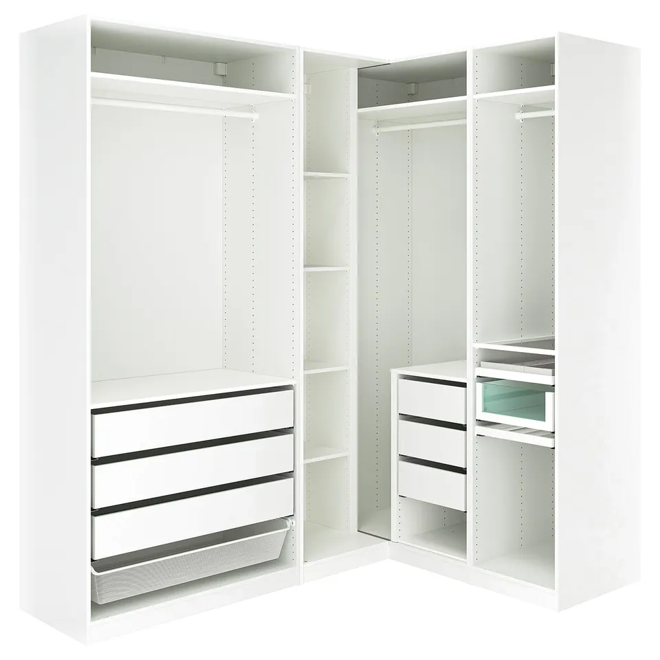 A white corner wardrobe system named PAX, featuring drawers, shelves, and a mesh basket for storage.