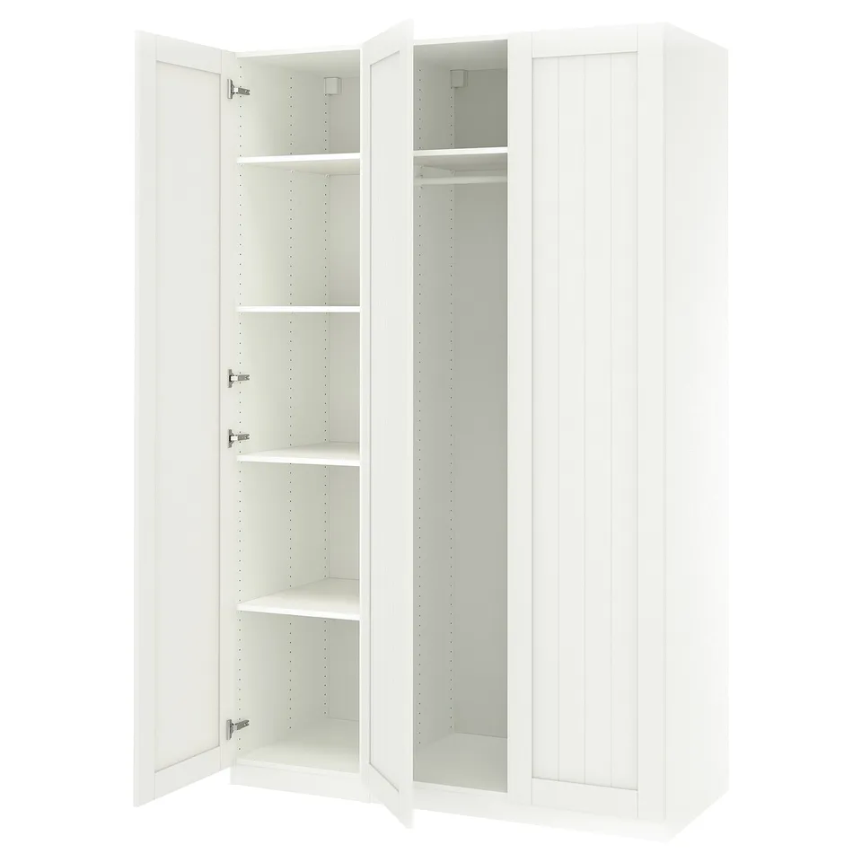 White PAX wardrobe with open doors revealing shelves and hanging rod.