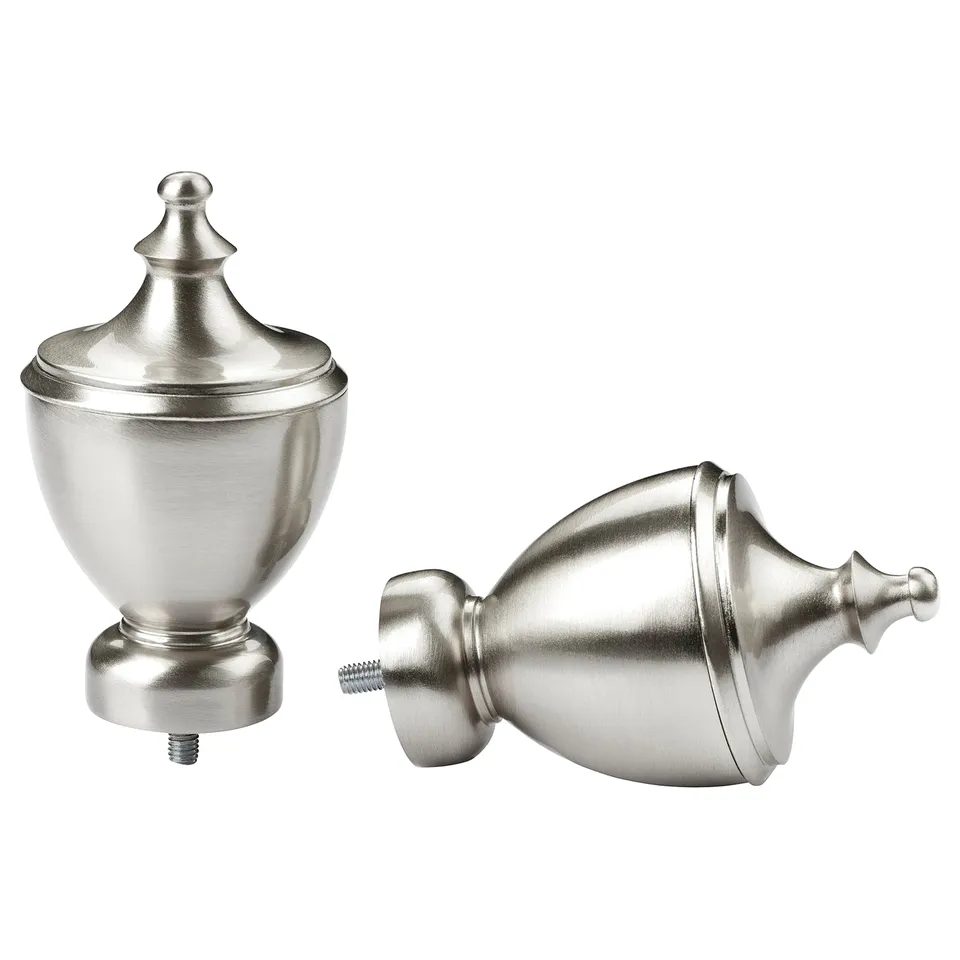 Silver trophy finials with nickel screws.