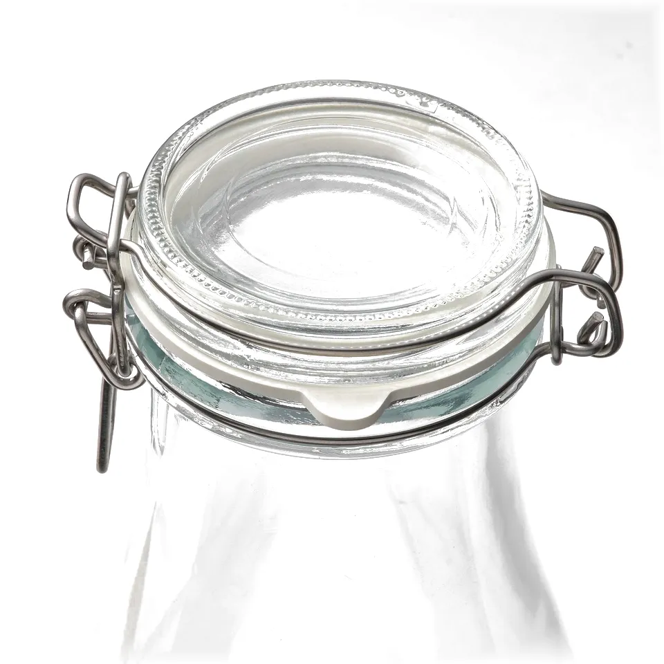 Empty glass jar with metal clasp lid, seal visible.