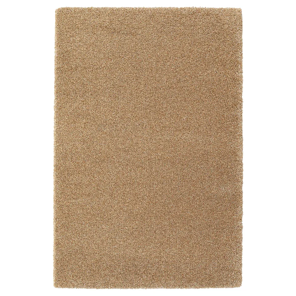 A rectangular brebärare rug in beige, featuring a soft texture and round, short pile made from polypropylene.