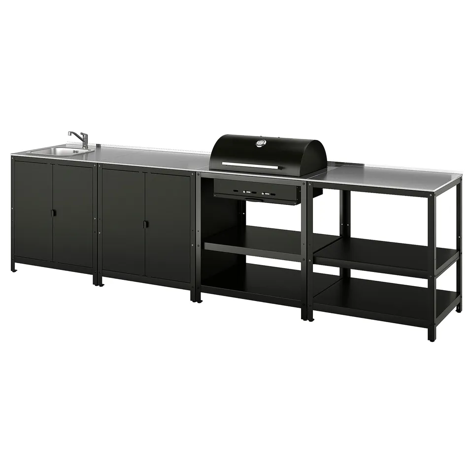 Its an outdoor GRILLSKÄR kitchen with sink, grill, storage. Black, steel, rectangular, practical.
