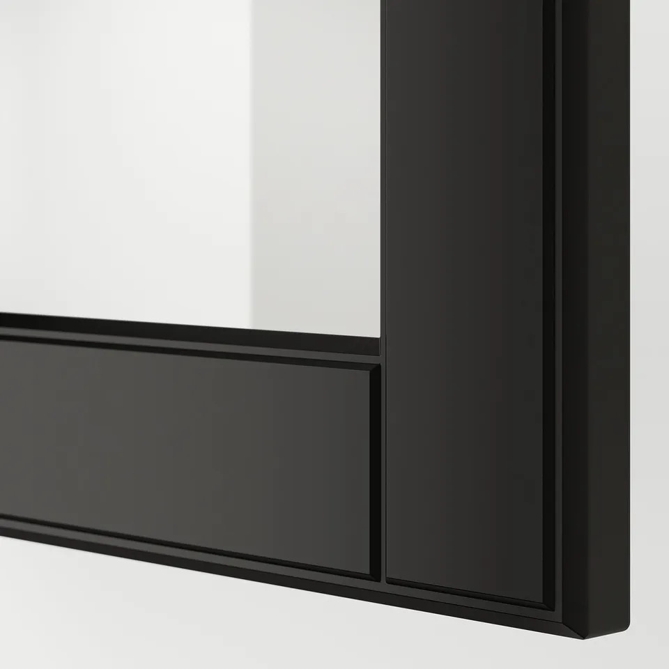 Close-up of glossy black framed cabinet showing sleek, modern design.