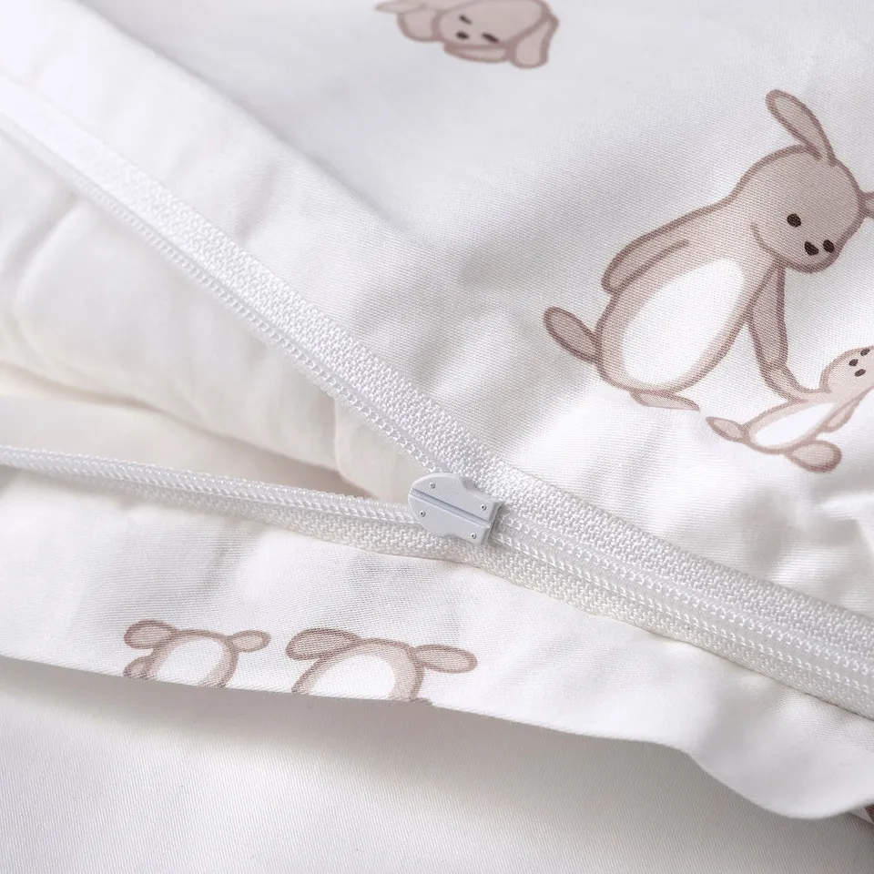 LEN Duvet cover 1 pillowcase for cot, white beige/bunny pattern, 110x125/35x55 cm
