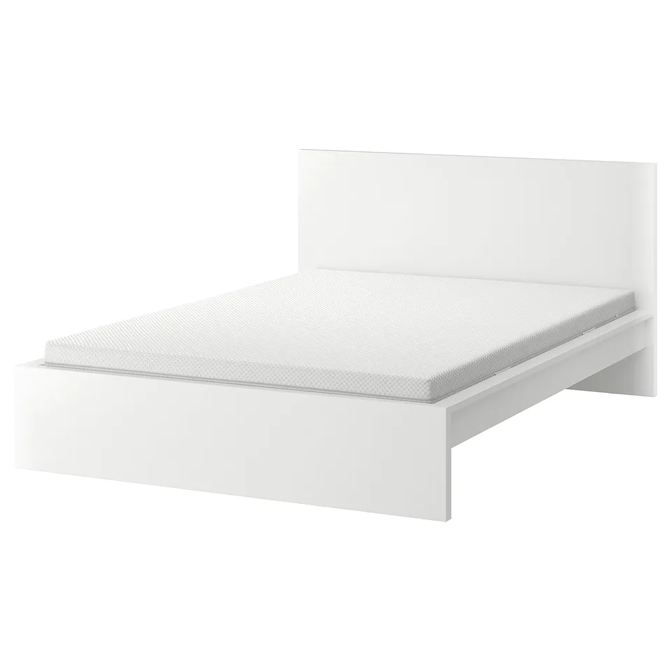Modern, white MALM bed with sleek design and adjustable headboard.