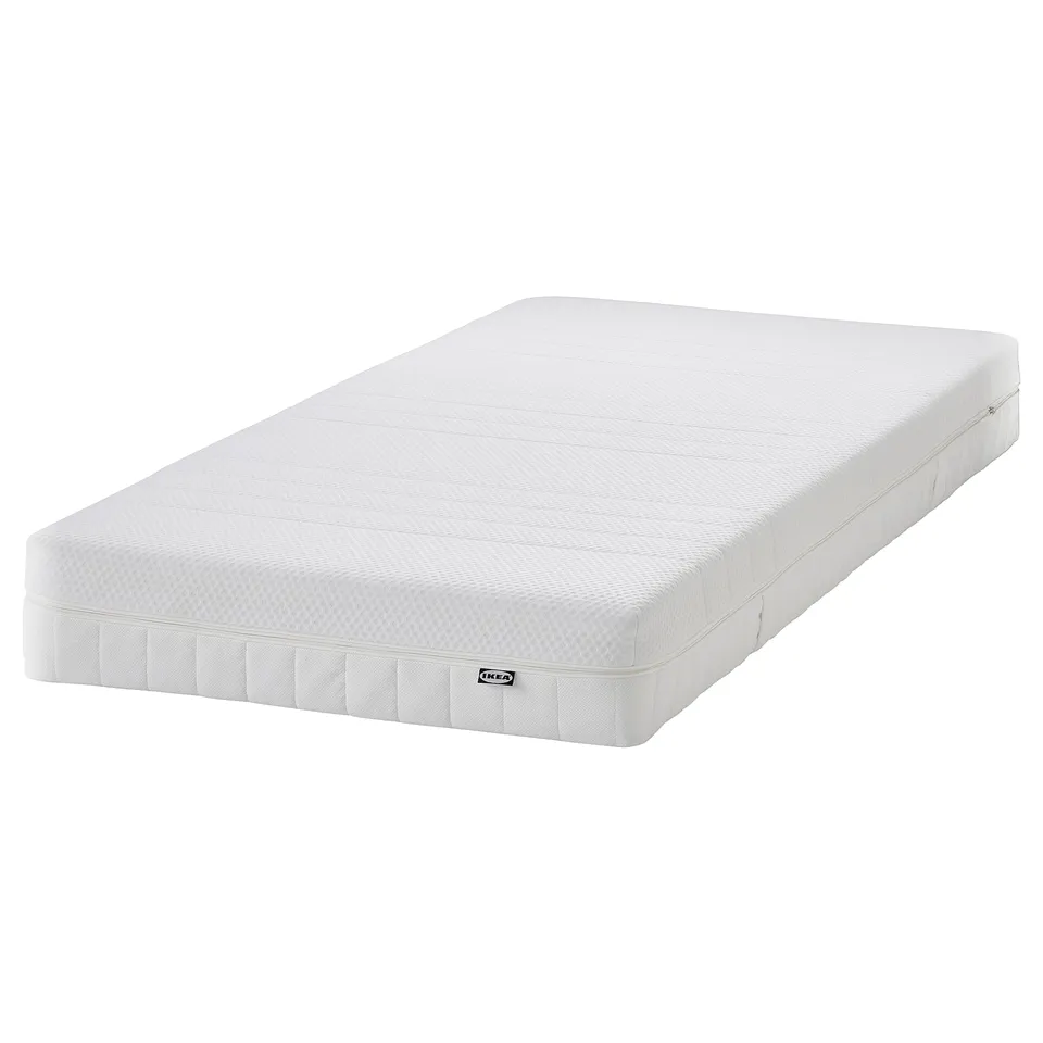 IKEA HEMNES white foam mattress, rectangle, clean design.
