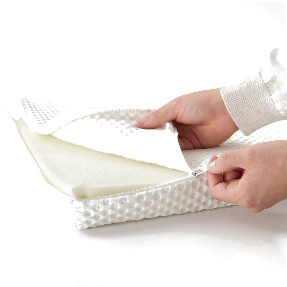 Person zips open mattress, showcasing memory foam for pressure relief.