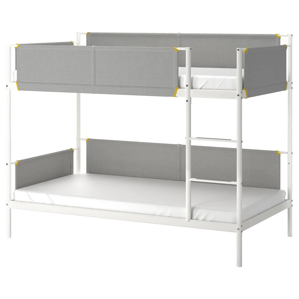 A white VITVAL bunk bed with grey fabric guardrails, featuring soft shapes and elastic edge bands.