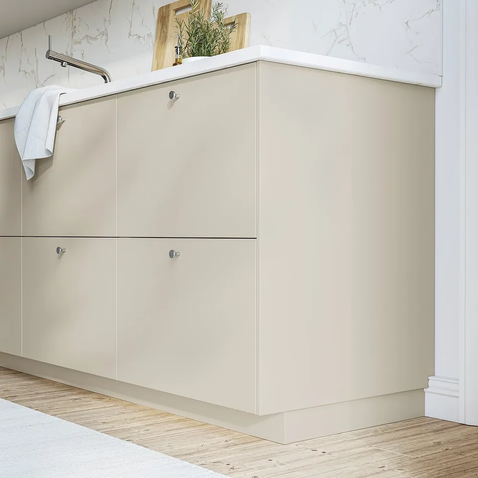 HAVSTORP beige cabinet with smooth front; wooden floor; marble backsplash; towel rail.