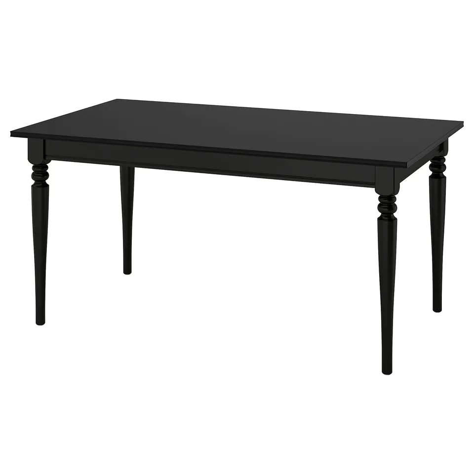 ROSENTORP black rectangular dining table with turned legs and self-storing leaf.