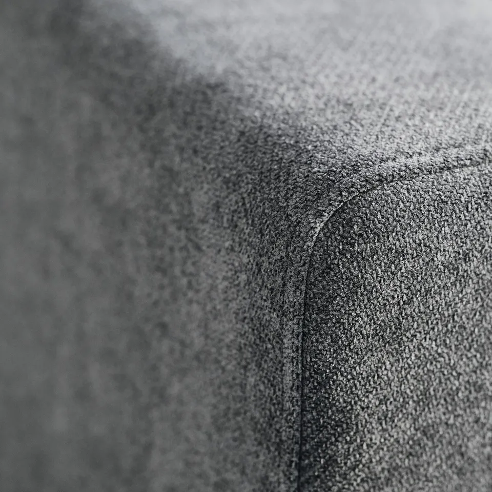 Close-up of UPPÅKRA sofa fabric, smooth texture, durable weave.