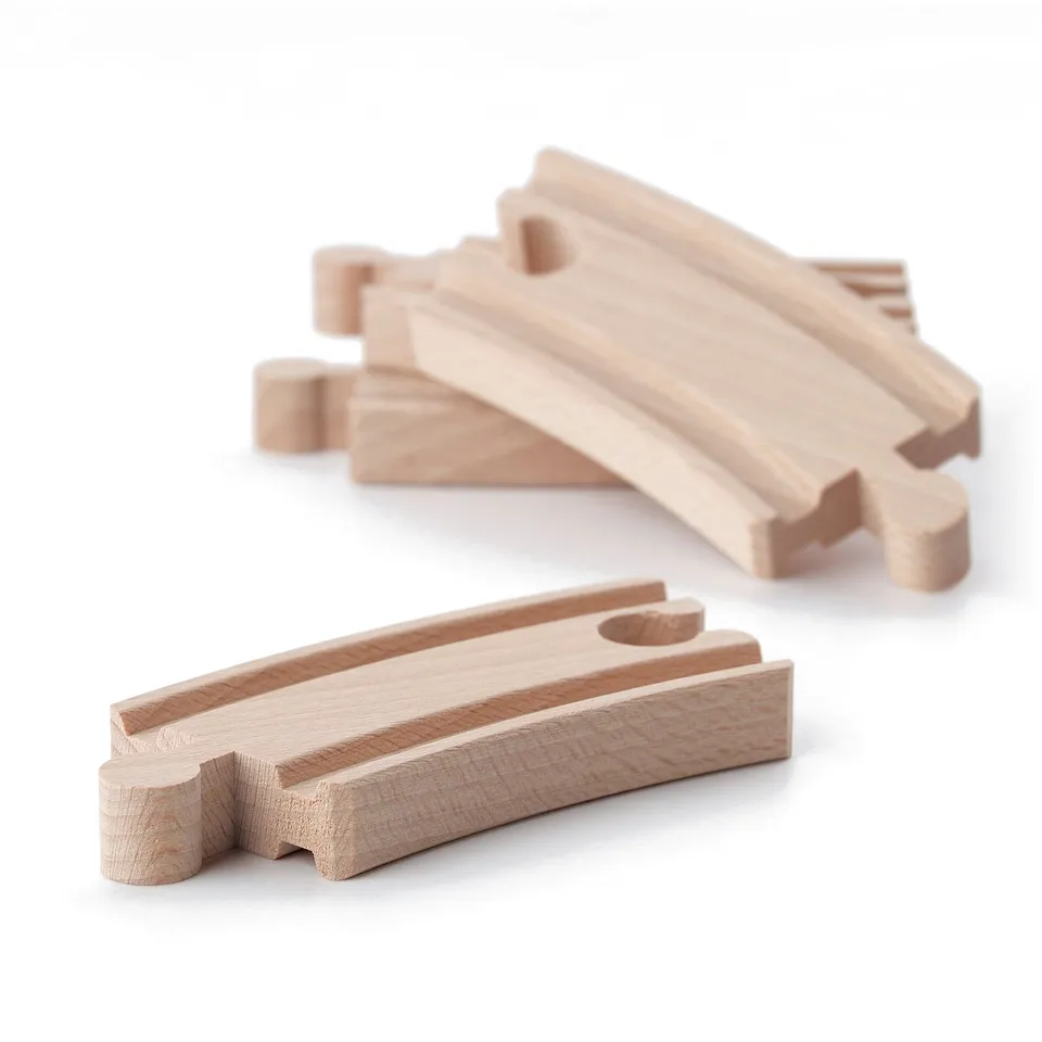 Wooden train track pieces, crafted from smooth beech, arranged neatly. Ideal for childrens play, promoting creativity and motor skills.