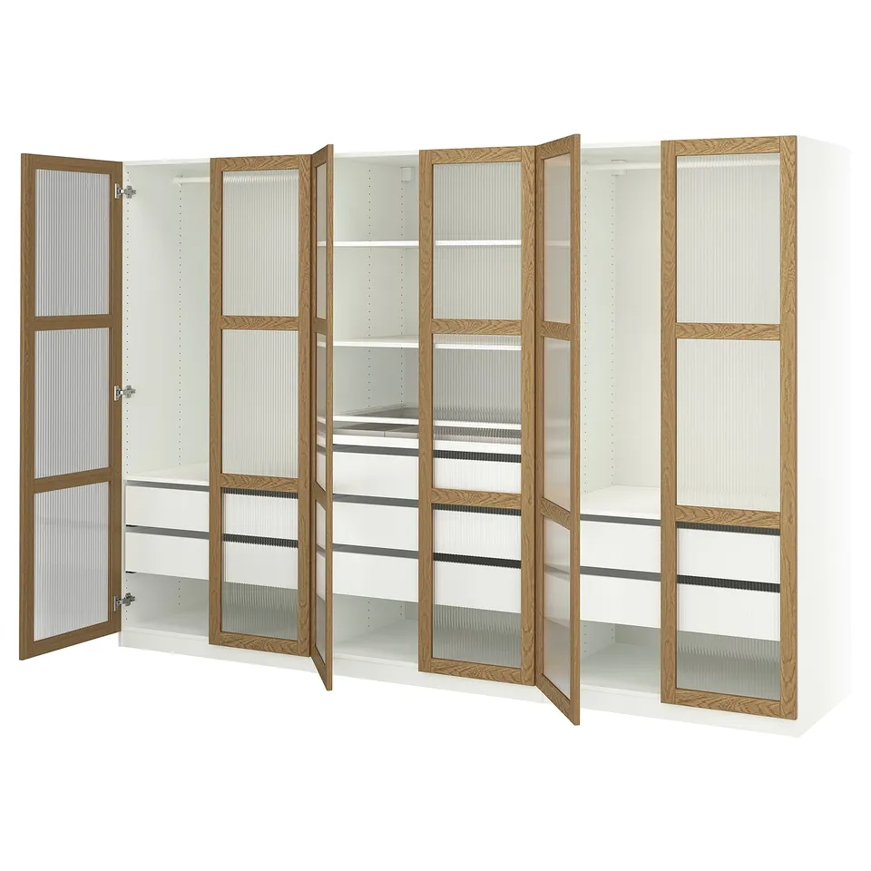 Displays an open white and oak PAX wardrobe with multiple shelves and compartments.