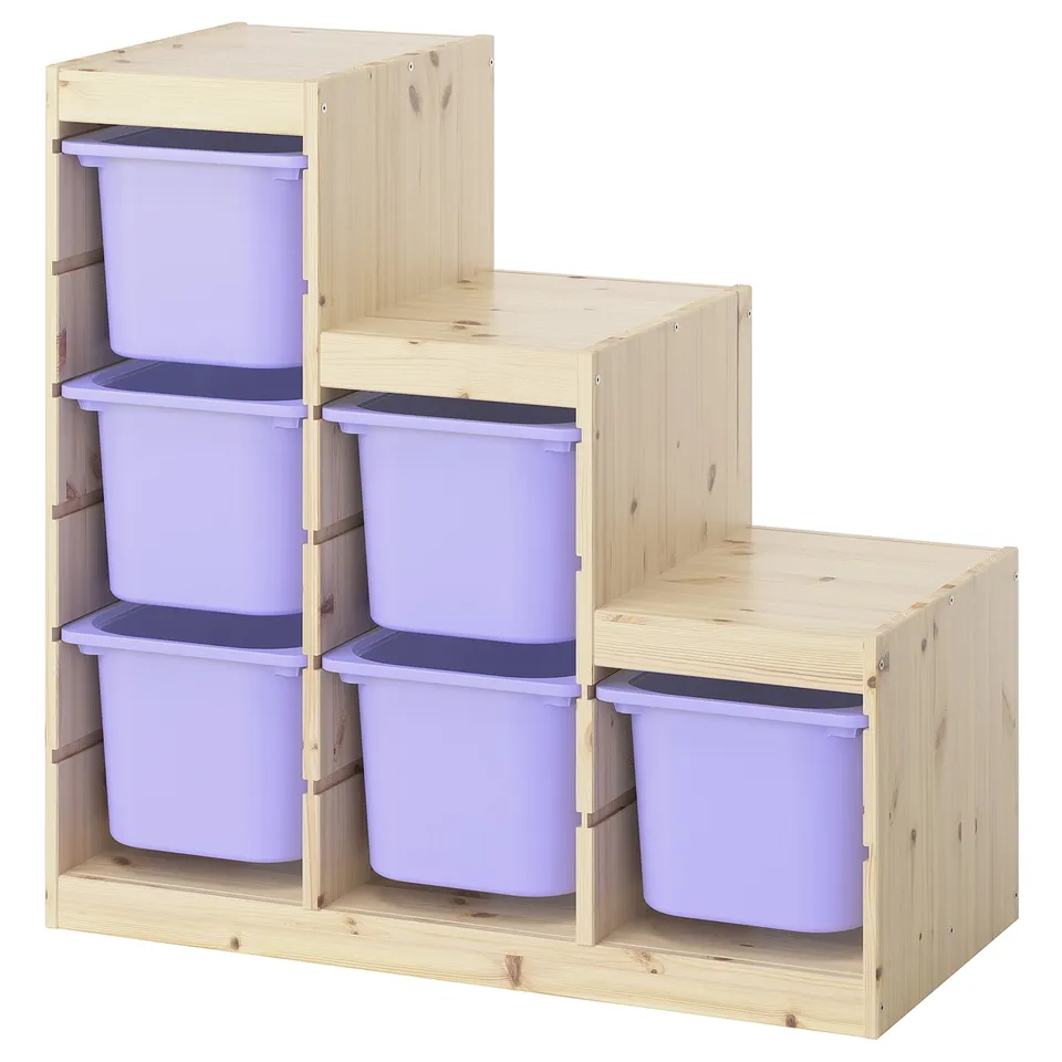 Wooden TROFAST storage with lavender plastic bins, stackable, for kids toys.