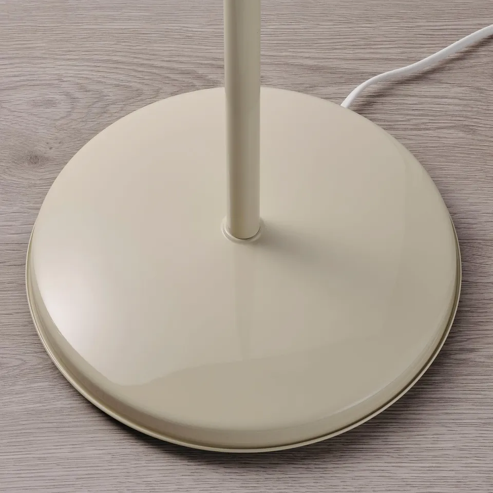 Modern floor lamp base, cream-colored with sleek, round design. High-quality finish, steady and stylish.