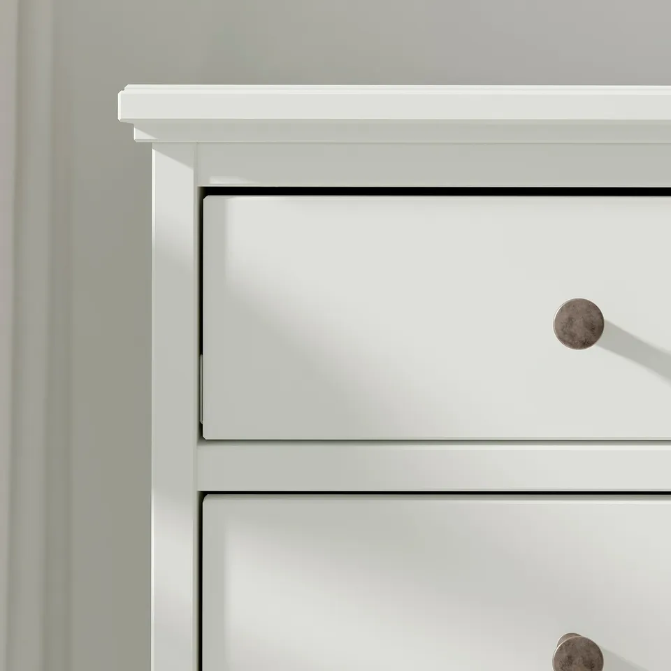 The IDANÄS high white chest clean lines and multiple drawers with rounded knobs, perfect for organised storage.