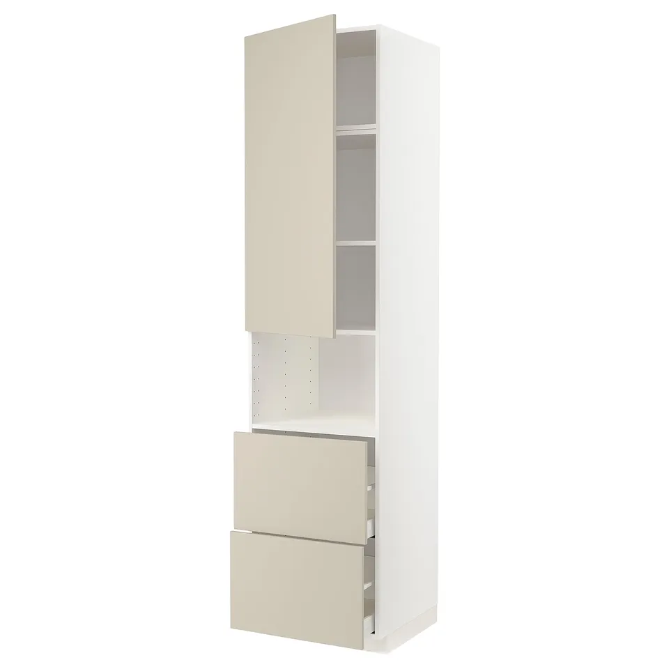 A white METOD kitchen cabinet with beige havstorp handles. It has a tall, rectangular shape with shelves and drawers.